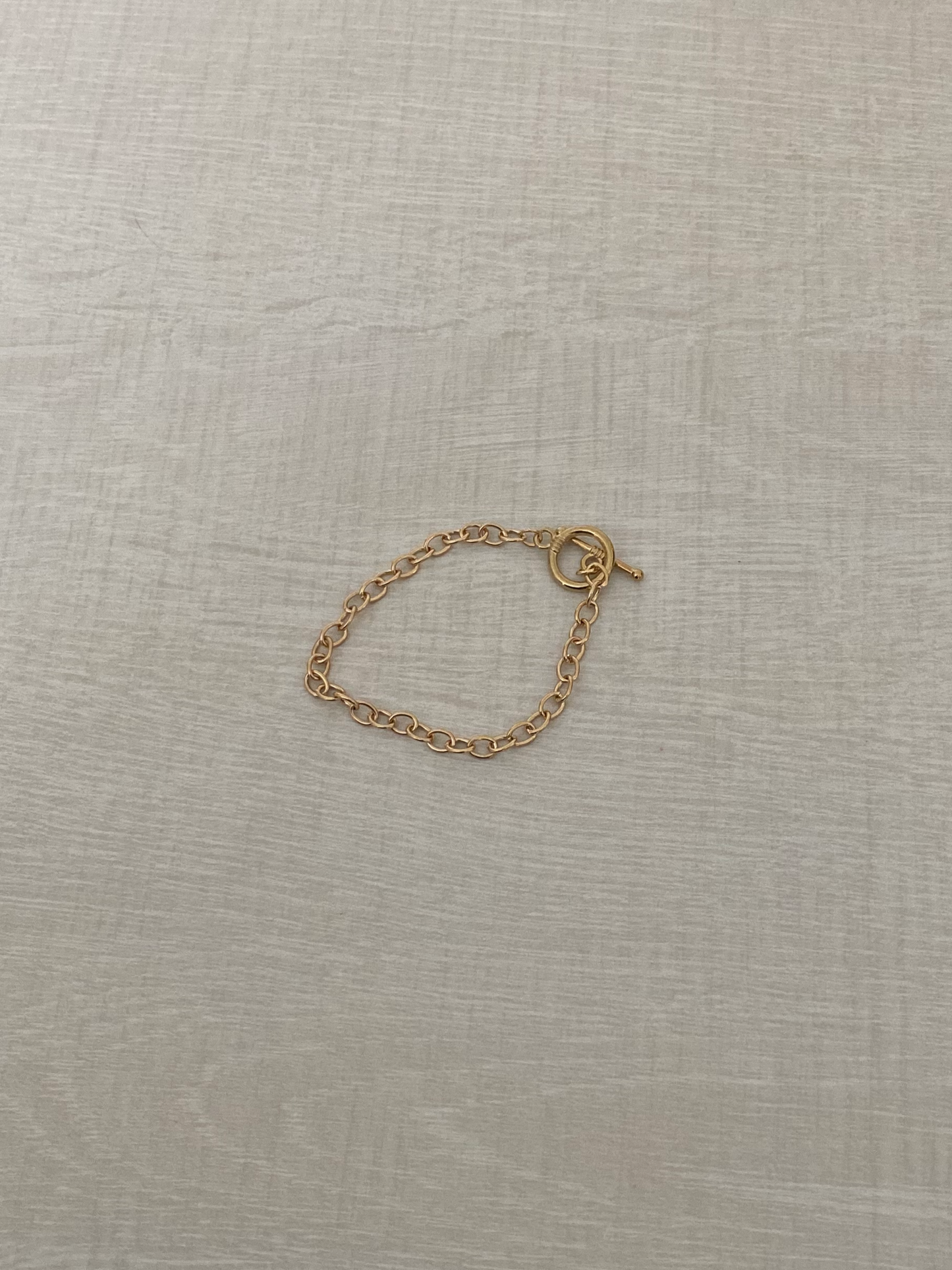 Gold charm bracelet - thick chain