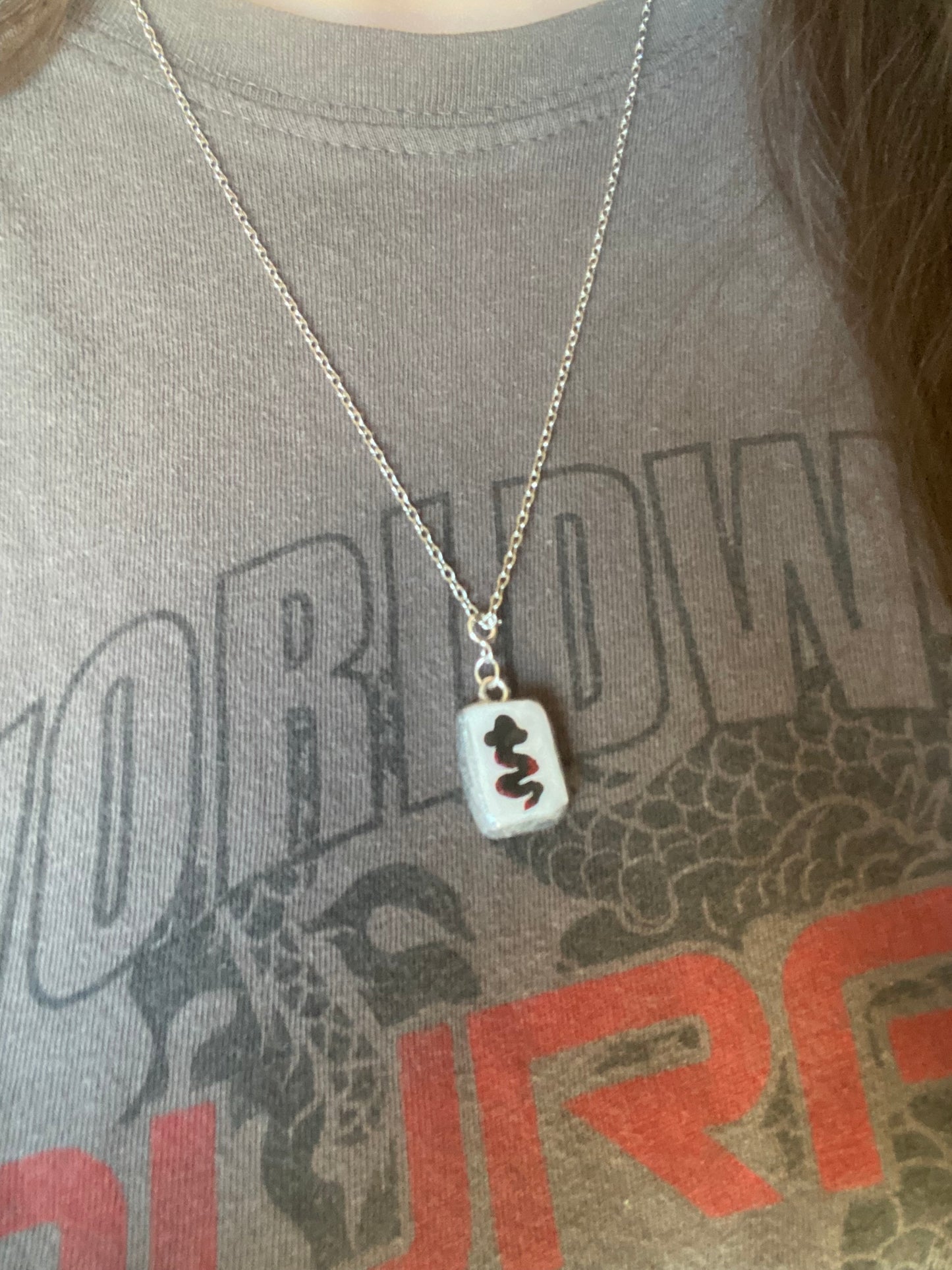 Reputation snake charm necklace